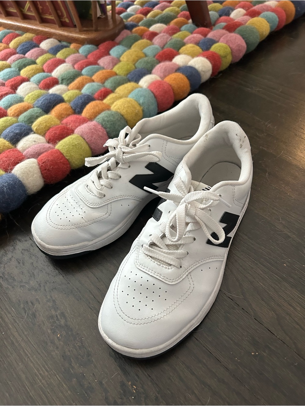 New Balance White Leather Sneakers with Black 'N' Logo